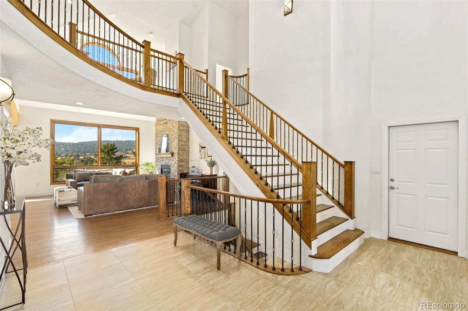 24140 Highway 40 Golden, CO 80401 - Photo 4 of 40 a view of entryway and hall with wooden floor