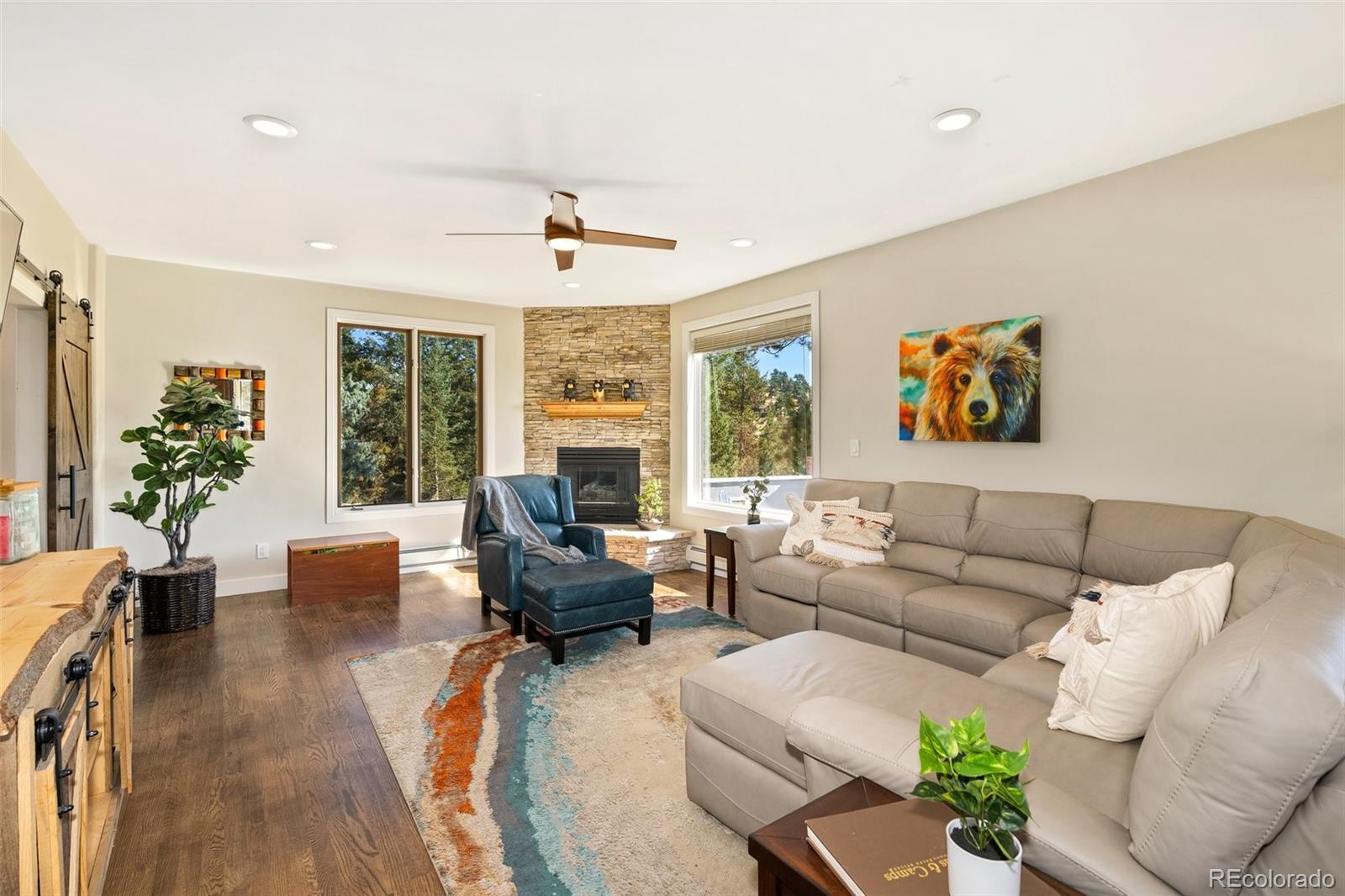24140 Highway 40 Golden, CO 80401 - Photo 6 of 40 a living room with furniture and a large window