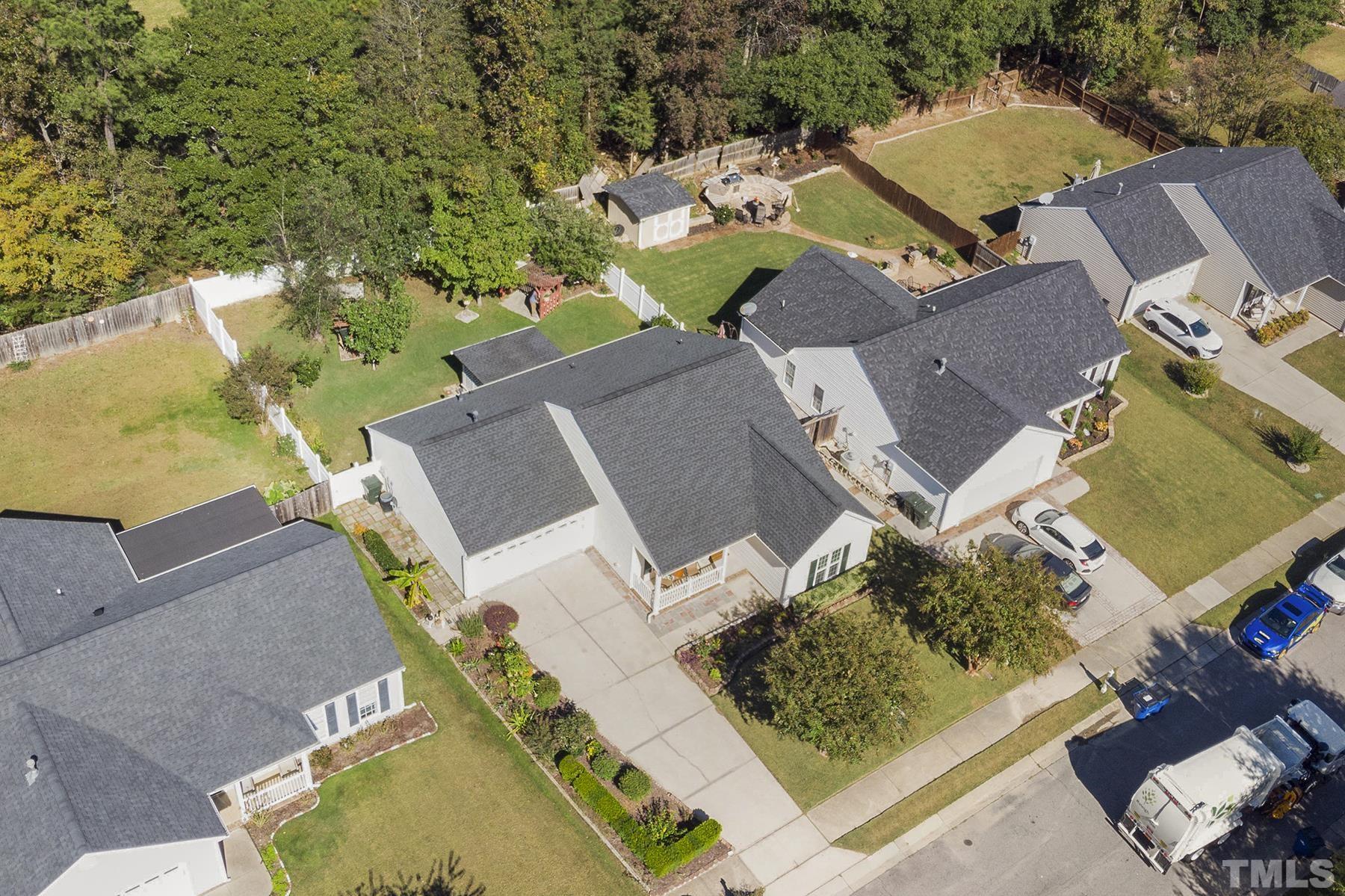 5413 Neuse Forest Road Raleigh, NC 27616 - Photo 3 of 27 an aerial view of a house with a swimming pool