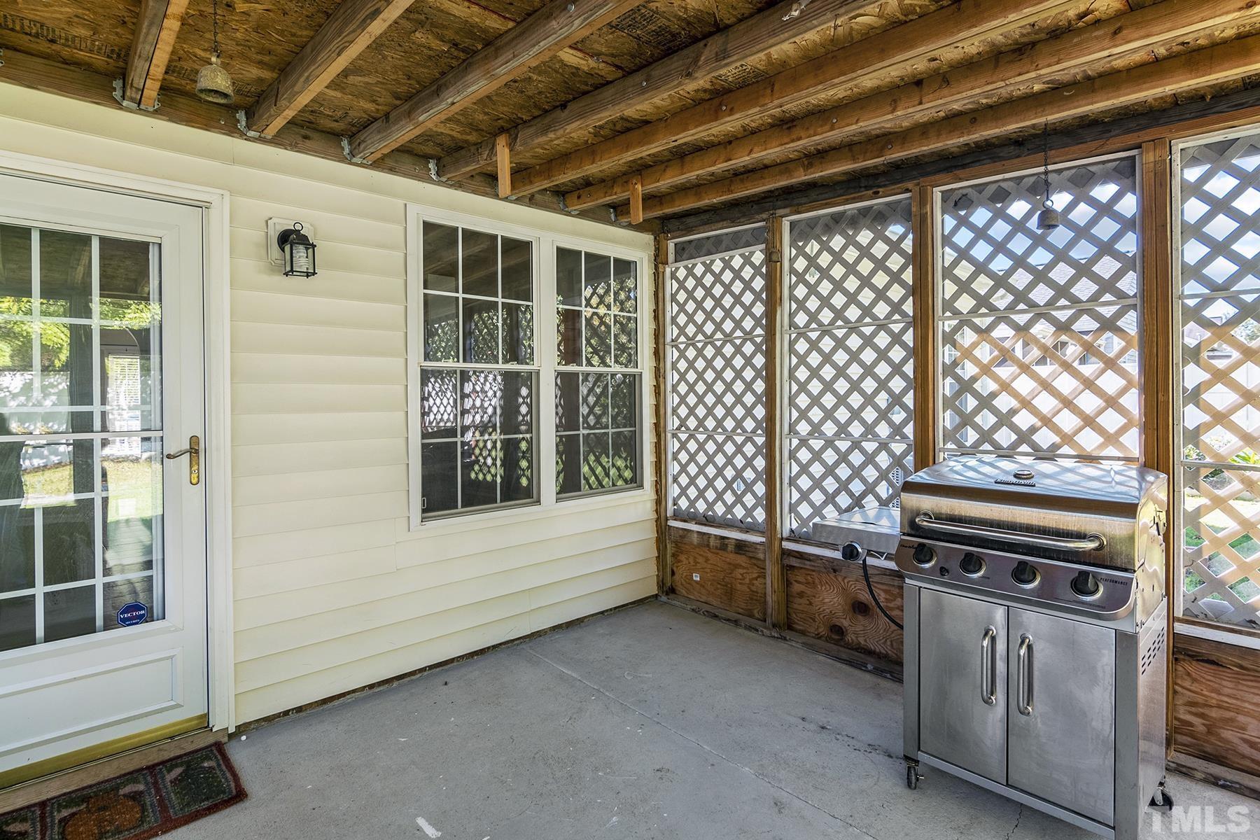 5413 Neuse Forest Road Raleigh, NC 27616 - Photo 22 of 27 a view of an empty room with a window