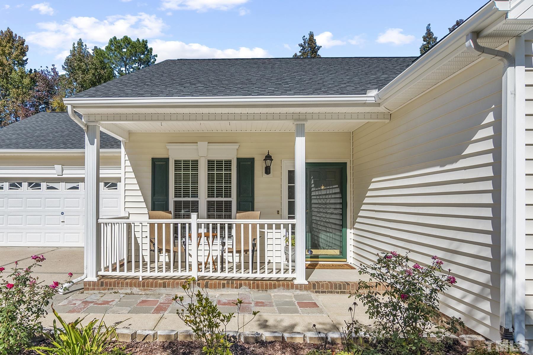 5413 Neuse Forest Road Raleigh, NC 27616 - Photo 5 of 27 a front view of a house with a chair