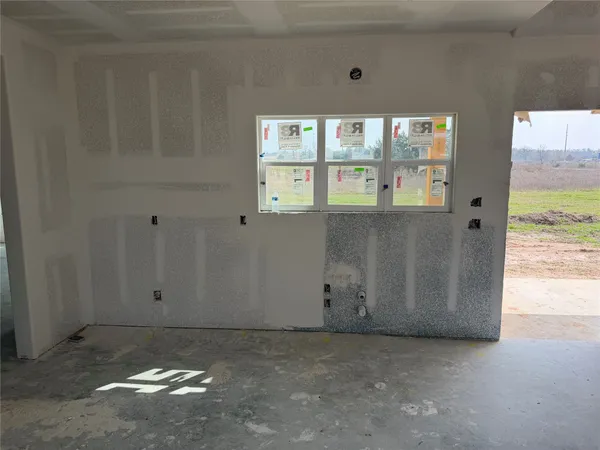 a view of a livingroom from a hallway