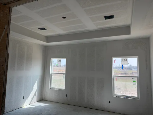 a view of an empty room and window