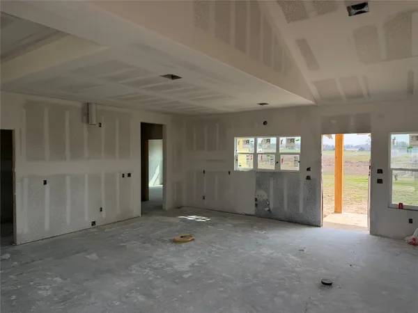 an empty room with windows