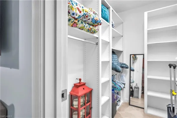 a view of a room with shelves and toys