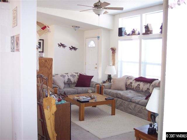 6805 Winnemucca Ranch Road Reno, NV 89510 - Photo 2 of 9 a living room with furniture and a window