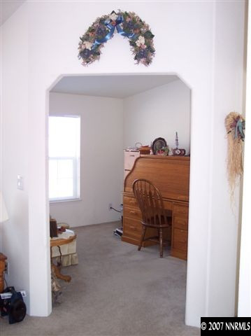 6805 Winnemucca Ranch Road Reno, NV 89510 - Photo 5 of 9 a bedroom with a bed and a window