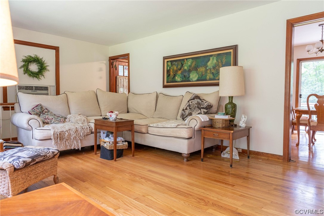 12808 South Chester Road Chester, VA 23831 - Photo 12 of 32 a living room with furniture and a wooden floor
