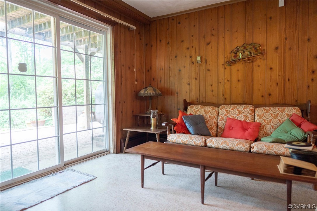12808 South Chester Road Chester, VA 23831 - Photo 25 of 32 a living room with furniture and a gate