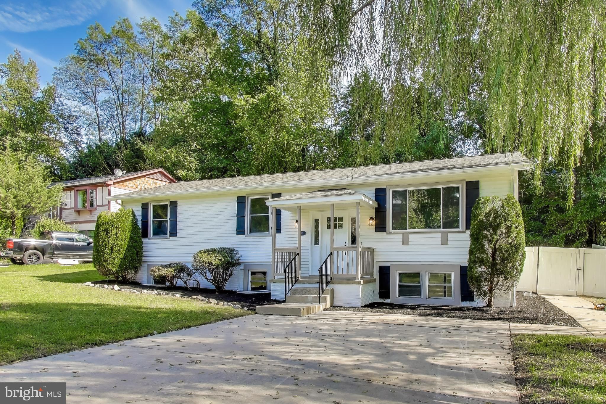 18905 Red Oak Lane Triangle, VA 22172 - Photo 1 of 38 a view of a house with backyard