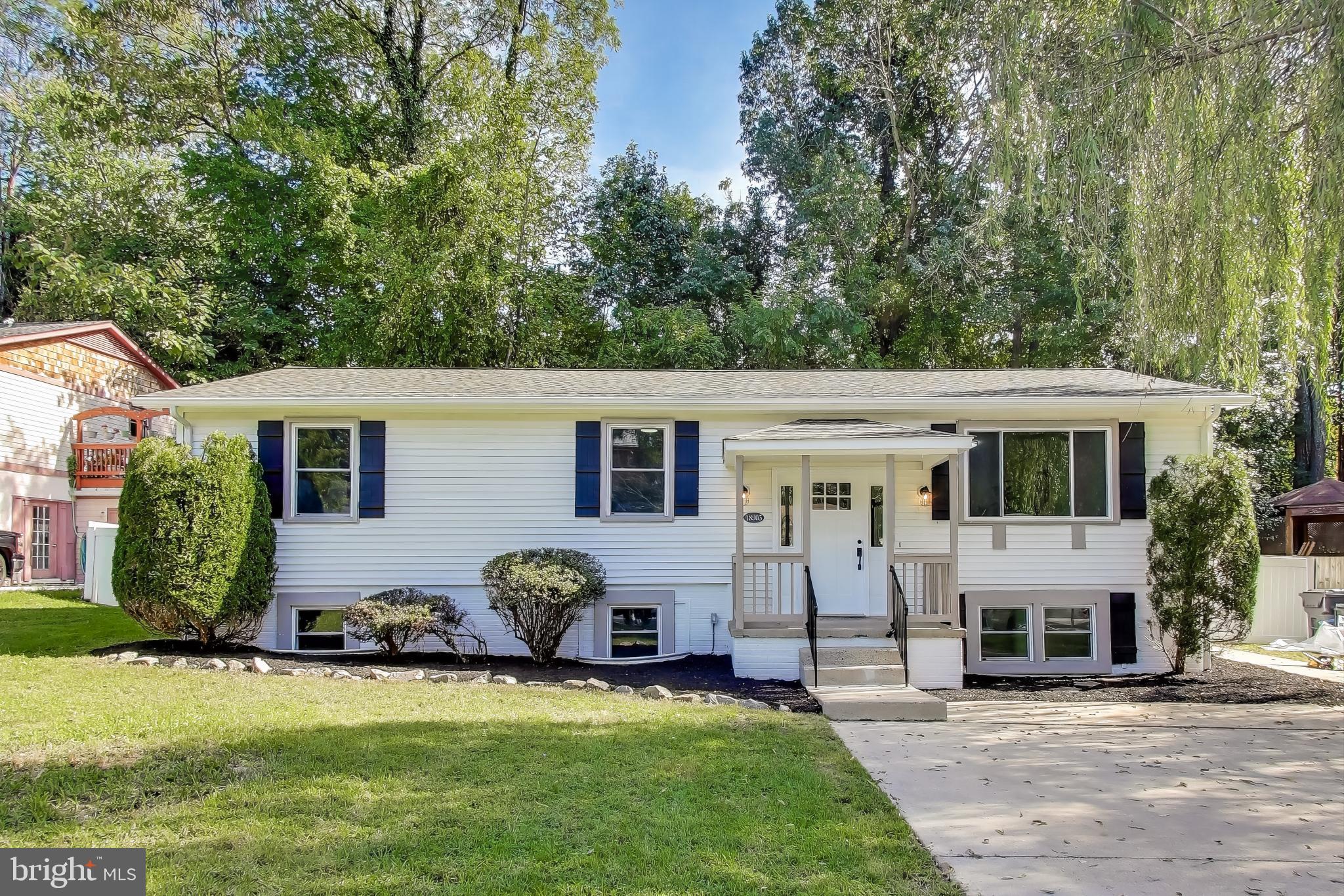 18905 Red Oak Lane Triangle, VA 22172 - Photo 2 of 38 a view of a yard in front of a house