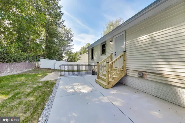 a view of a backyard with a garden
