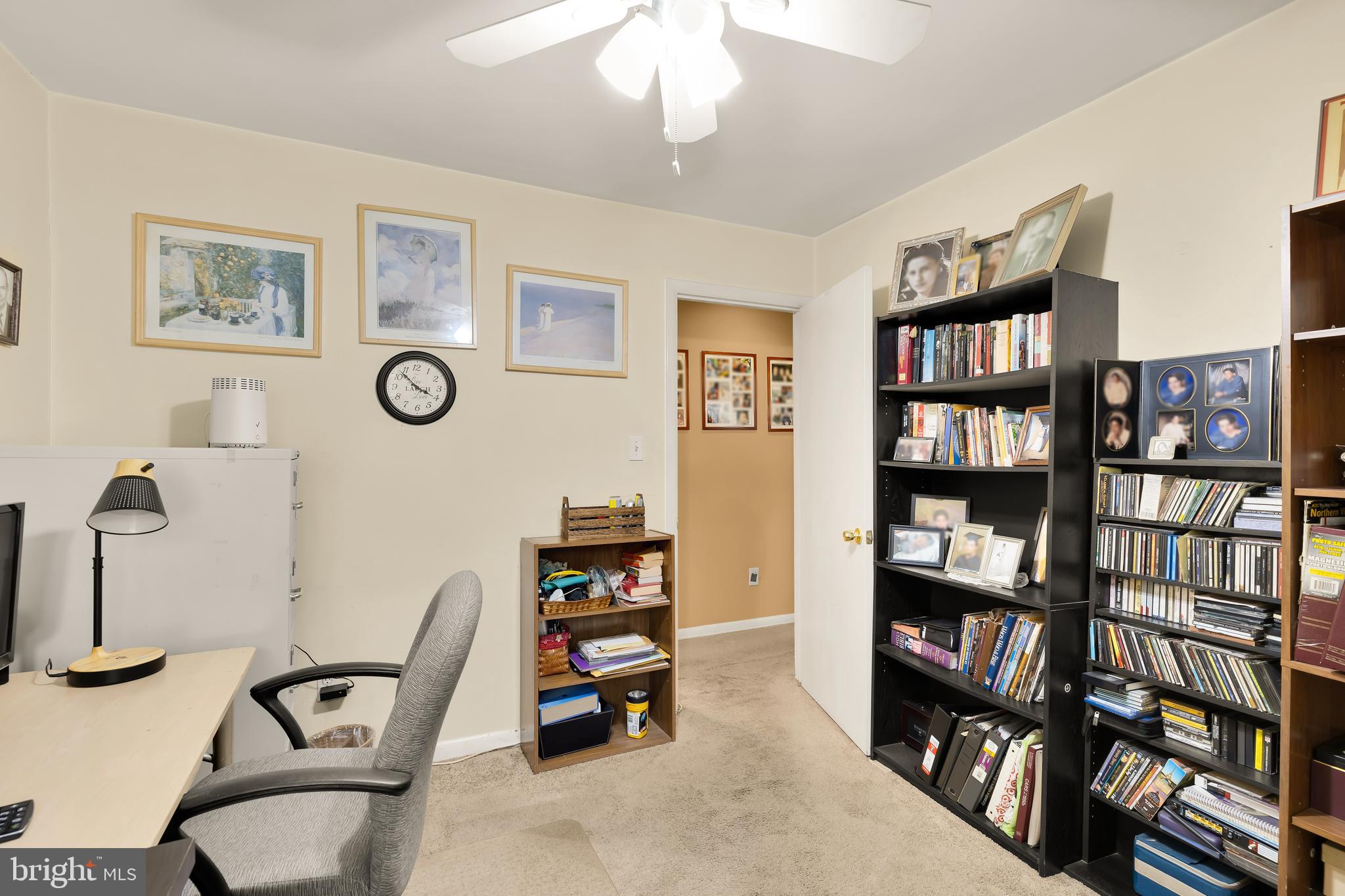 3313 Claridge Court Silver Spring, MD 20902 - Photo 18 of 23 a view of a workspace with bookshelf and a window