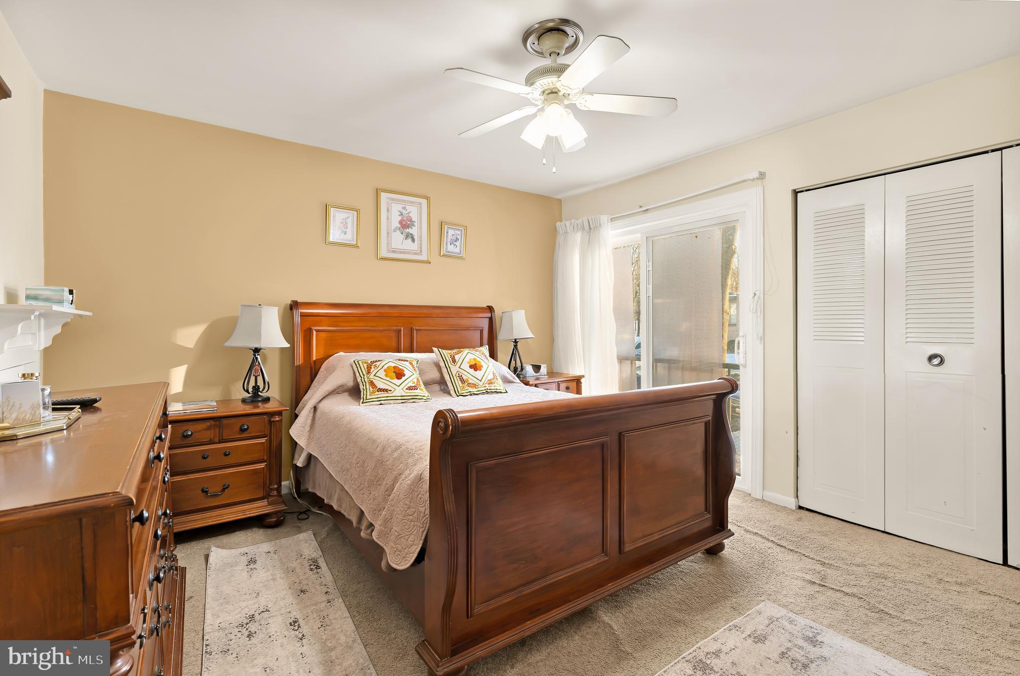 3313 Claridge Court Silver Spring, MD 20902 - Photo 21 of 23 a bedroom with a bed and a chandelier