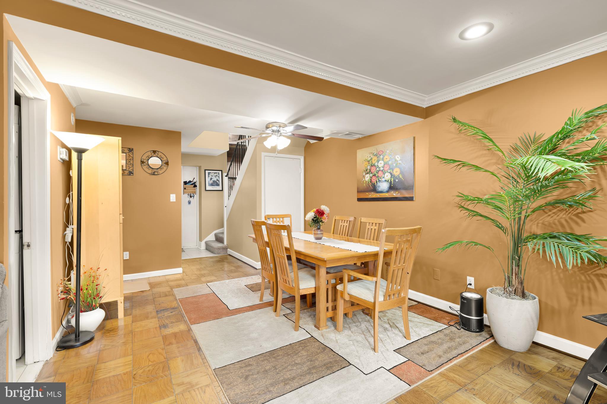 3313 Claridge Court Silver Spring, MD 20902 - Photo 5 of 23 a dining room with wooden floor and glass door