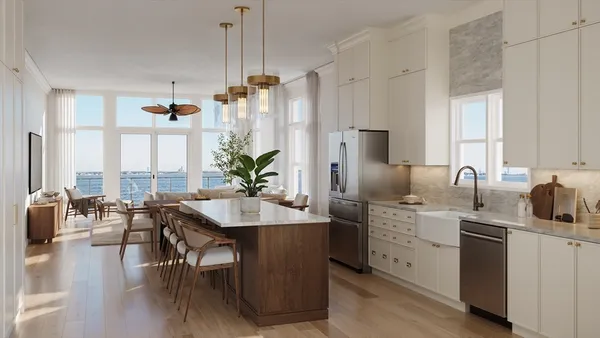 a kitchen with a table chairs stove and cabinets