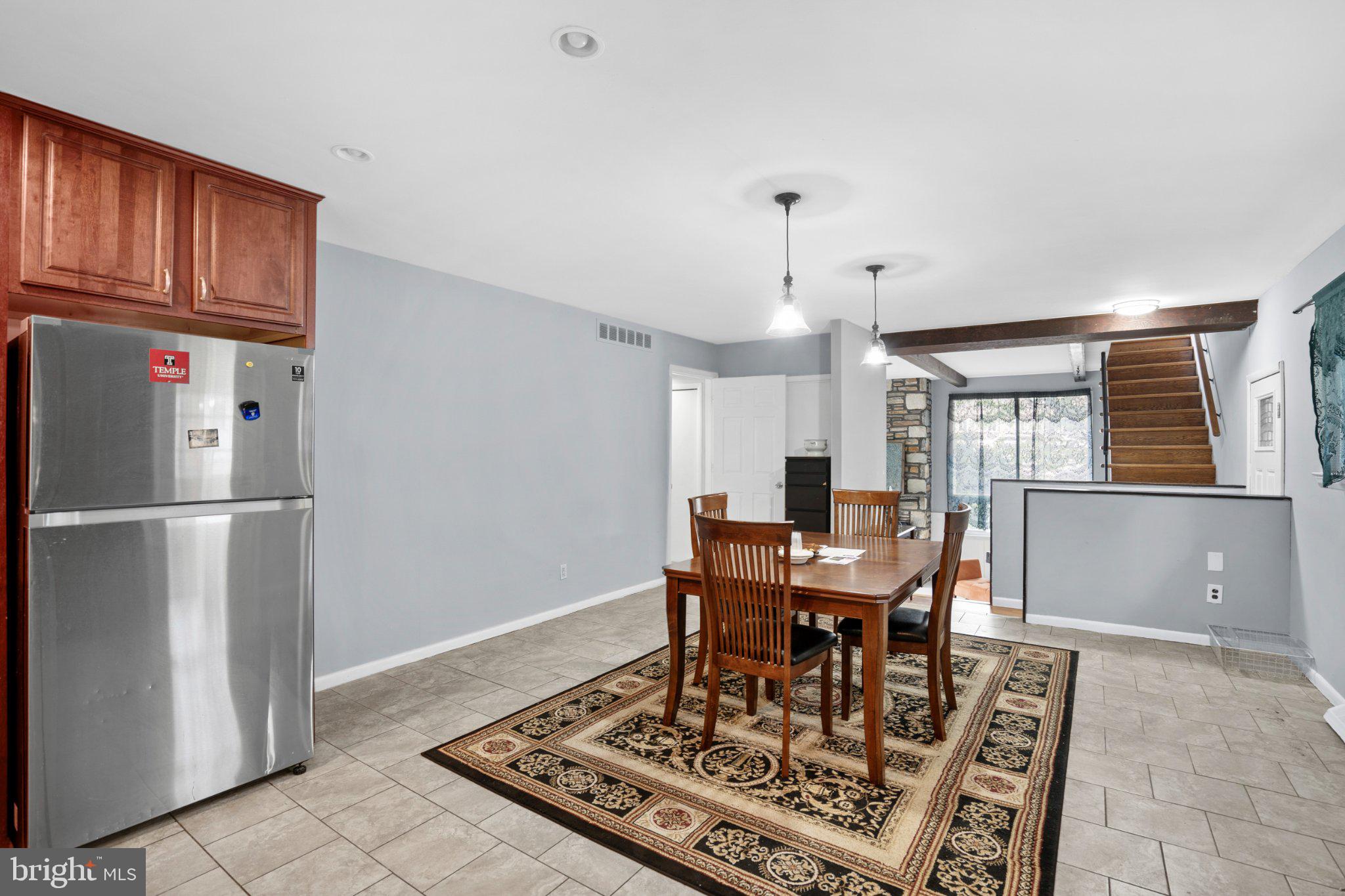 609 Foster Road Cheltenham, PA 19012 - Photo 8 of 44 Spacious dining area with modern flair.