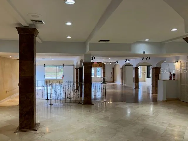 a view of a lobby with gym equipment