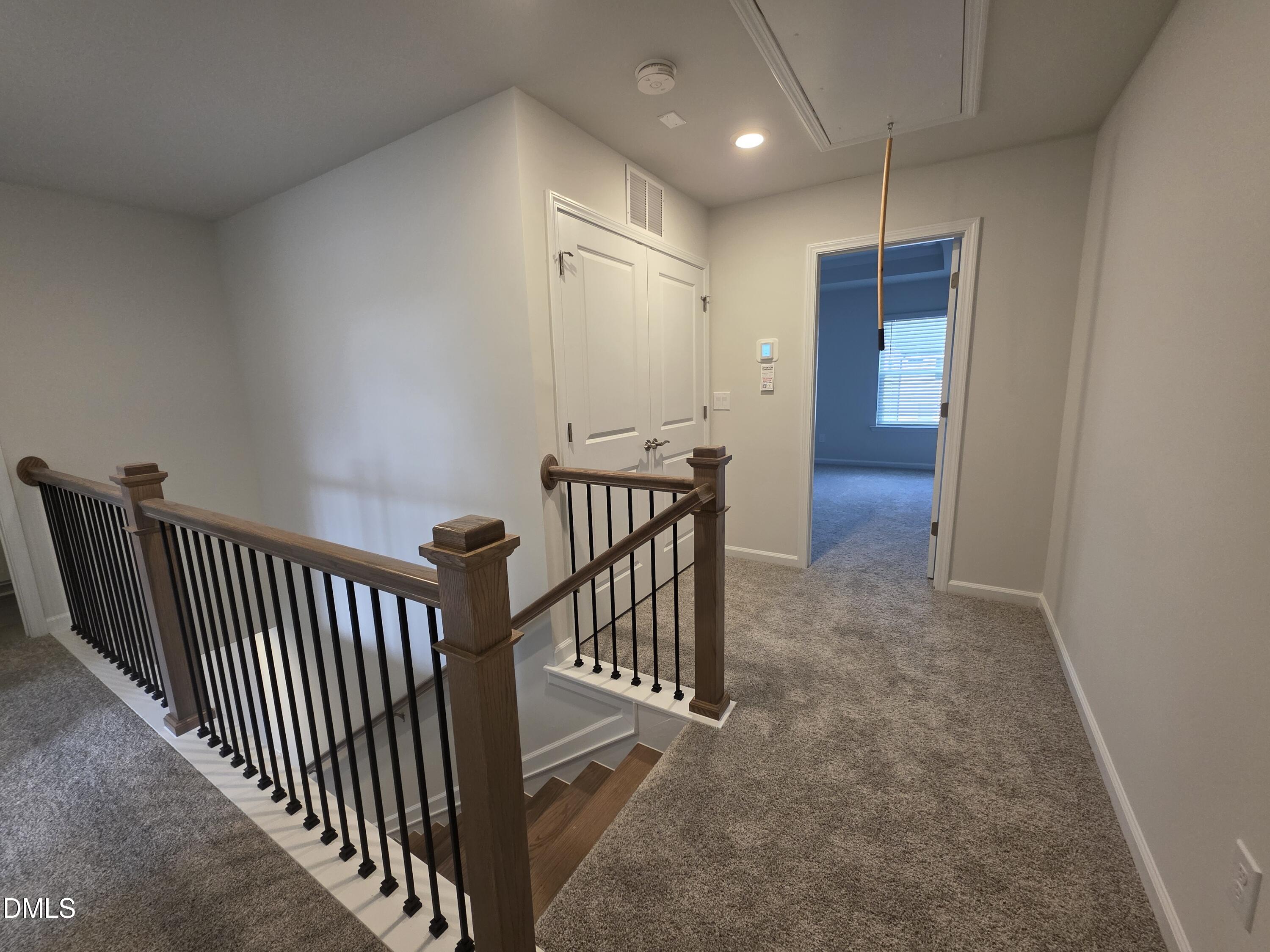 2540 Olive Chapel Road Apex, NC 27502 - Photo 11 of 27 a view of hallway with livingroom