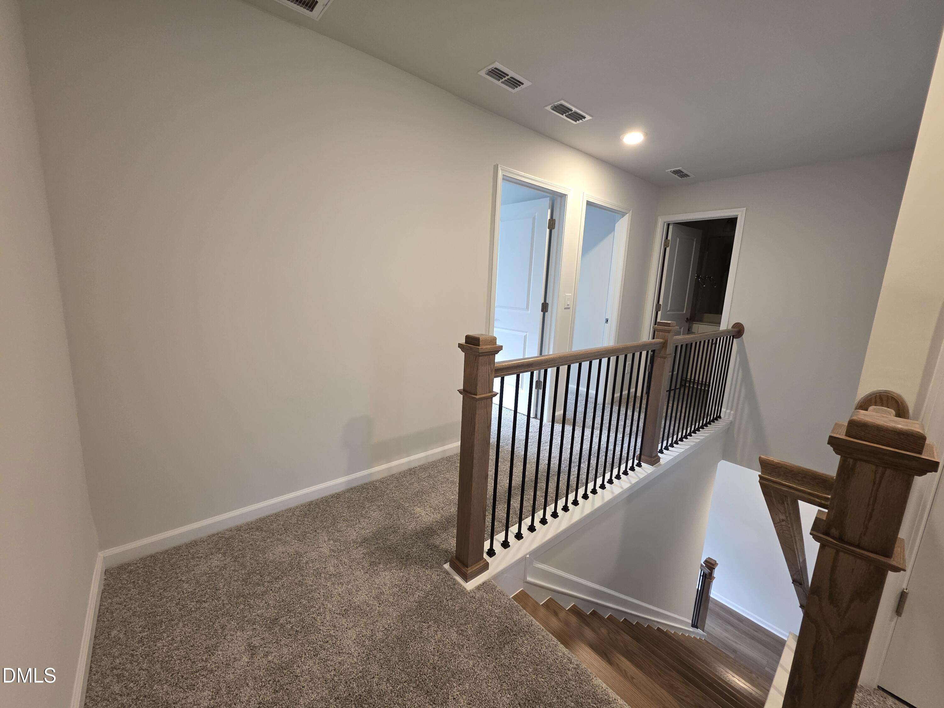 2540 Olive Chapel Road Apex, NC 27502 - Photo 12 of 27 a view of a hallway with workspace