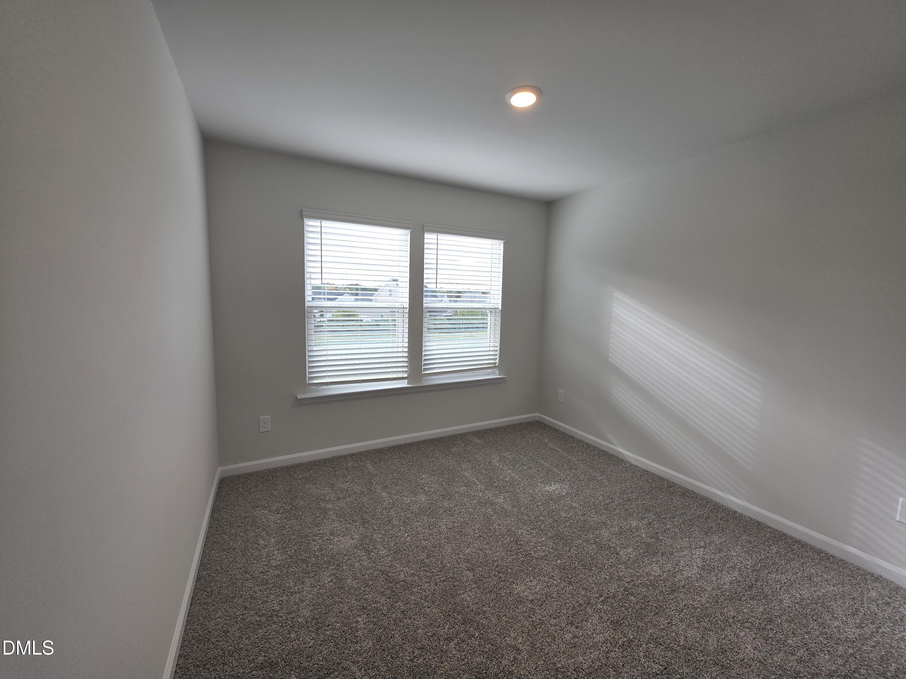 2540 Olive Chapel Road Apex, NC 27502 - Photo 14 of 27 an empty room with windows
