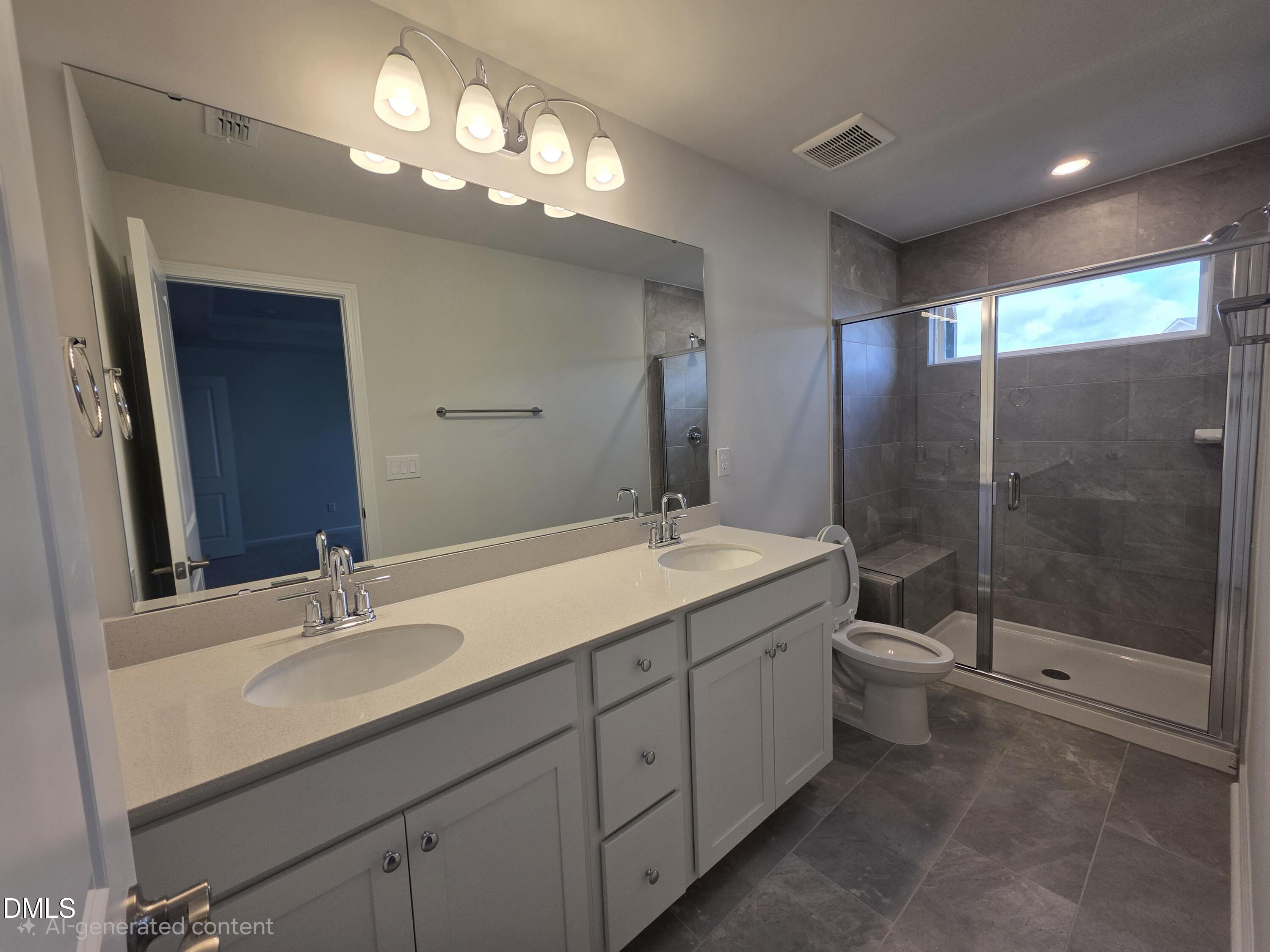2540 Olive Chapel Road Apex, NC 27502 - Photo 18 of 27 a bathroom with a double vanity sink and mirror