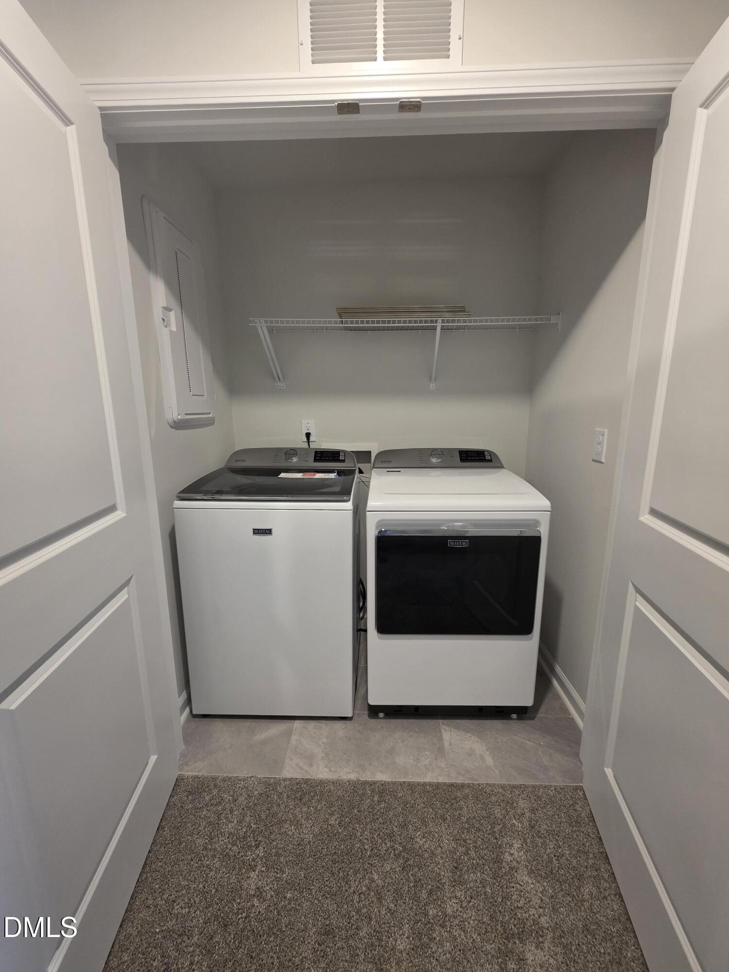 2540 Olive Chapel Road Apex, NC 27502 - Photo 20 of 27 a utility room with dryer and washer