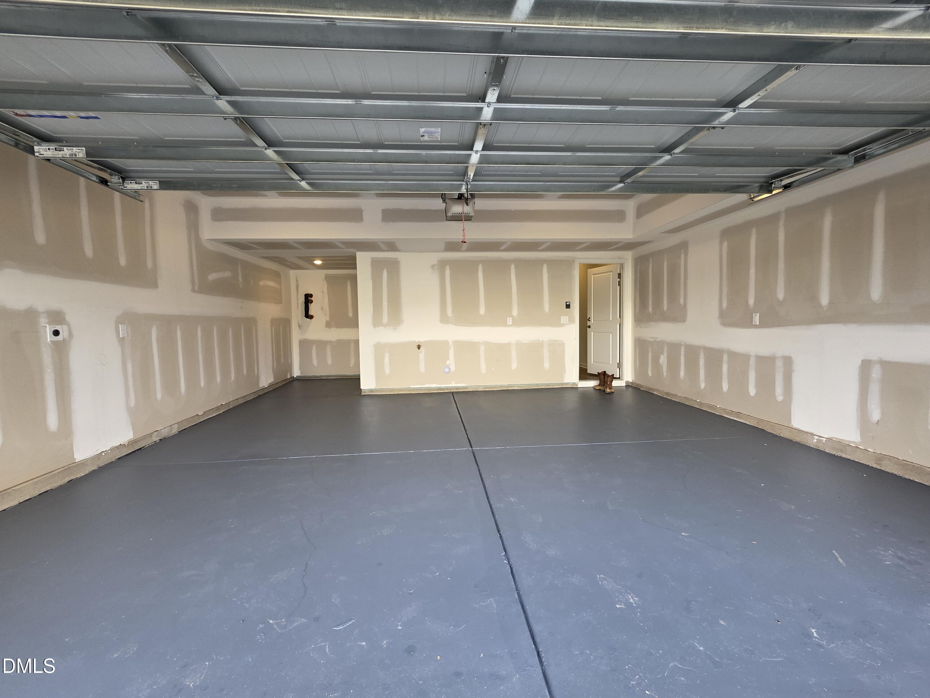 2540 Olive Chapel Road Apex, NC 27502 - Photo 21 of 27 a view of an empty room with a window