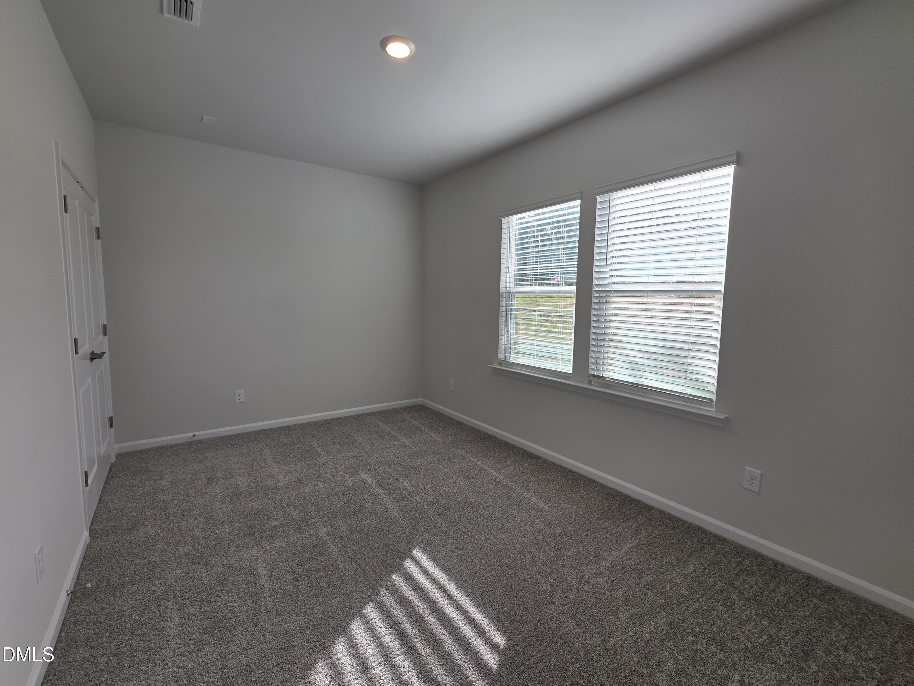 2540 Olive Chapel Road Apex, NC 27502 - Photo 3 of 27 an empty room with a window