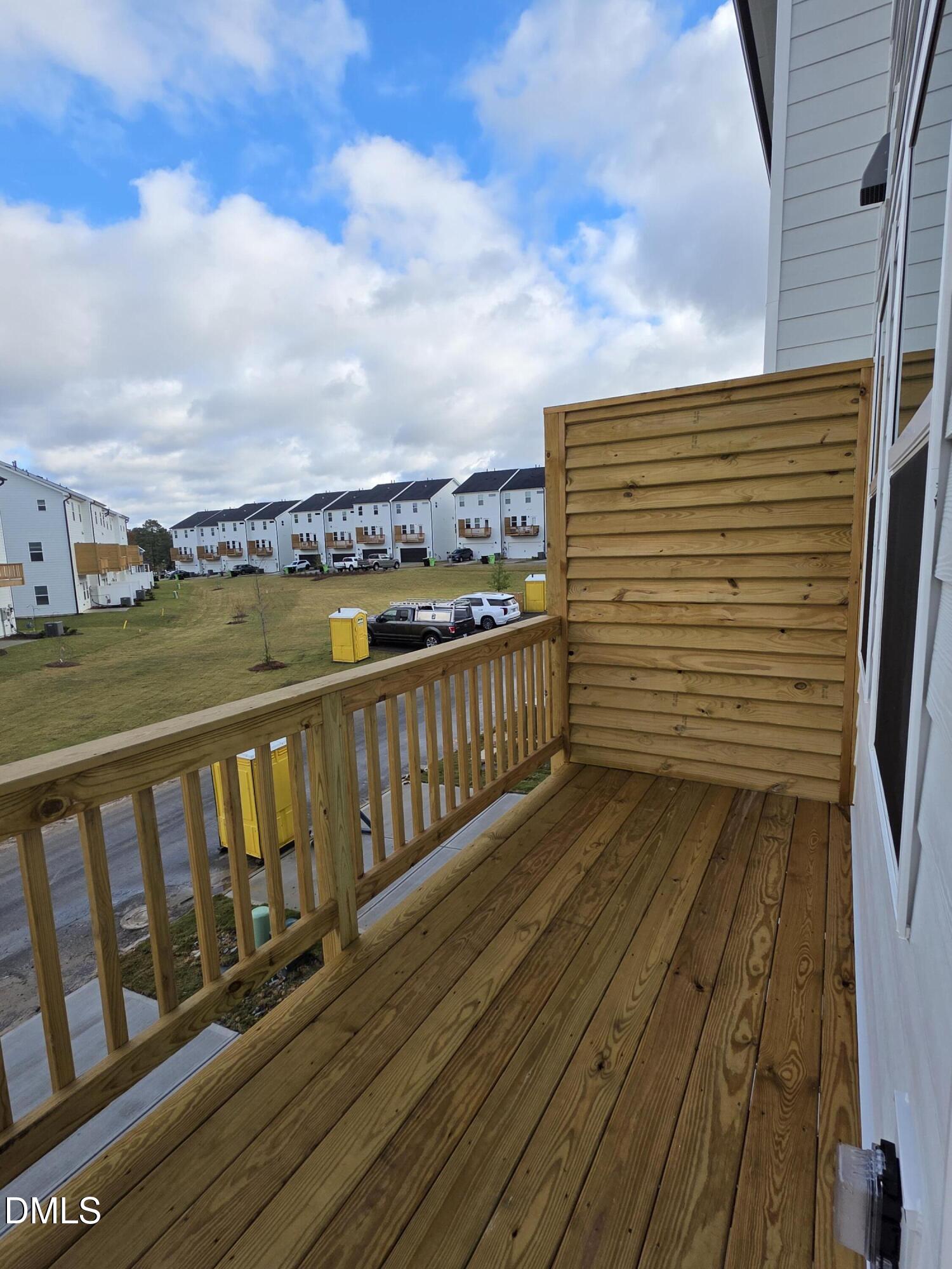 2540 Olive Chapel Road Apex, NC 27502 - Photo 10 of 27 a view of a balcony with wooden floor