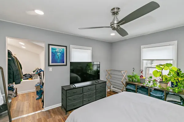 a room with furniture and a flat screen tv