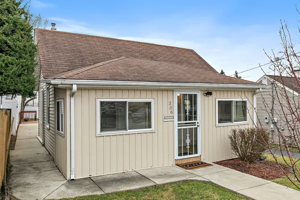 a front view of a house with garage