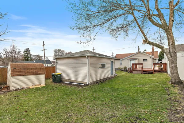 a view of a backyard with a garden