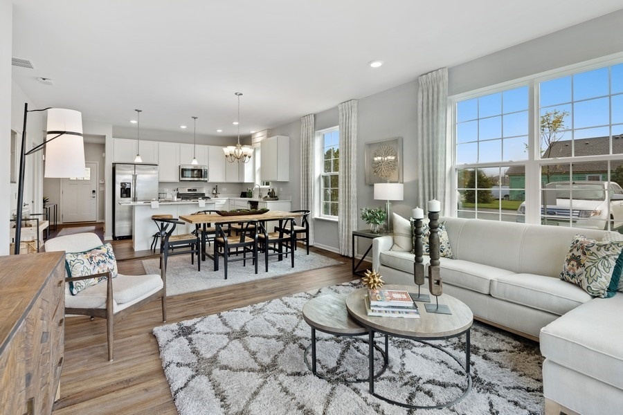 25612 West Springview Drive Plainfield, IL 60586 - Photo 10 of 23 a living room with furniture kitchen and a dining table