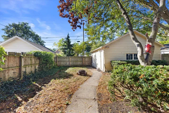 a backyard of a house with lots of green space