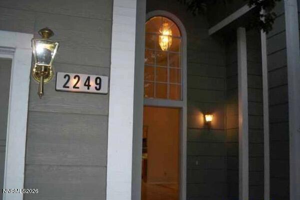 2249 Evans Creek Terrace Reno, NV 89519 - Photo 2 of 16 a view of an entryway door with lamp