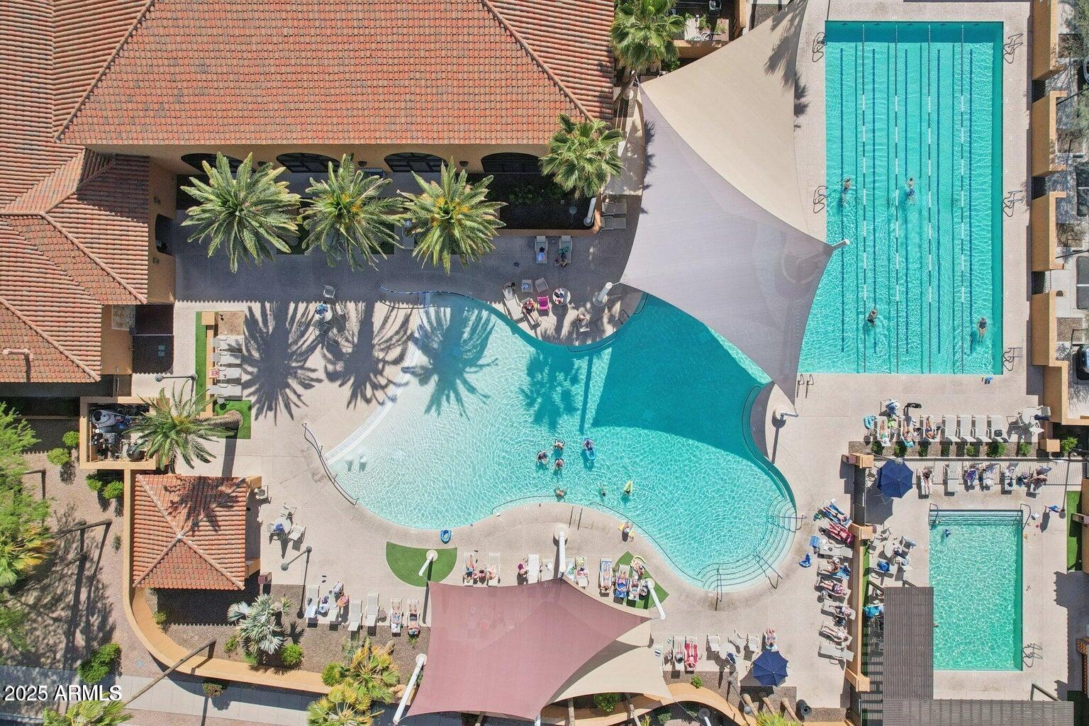 15415 West Merrell Street Goodyear, AZ 85395 - Photo 28 of 33 an aerial view of a house with garden space and swimming pool