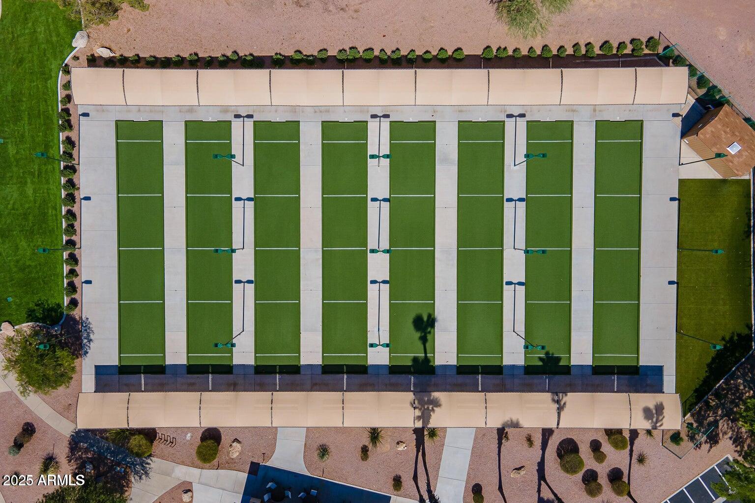 15415 West Merrell Street Goodyear, AZ 85395 - Photo 30 of 33 a front view of a house with a garden