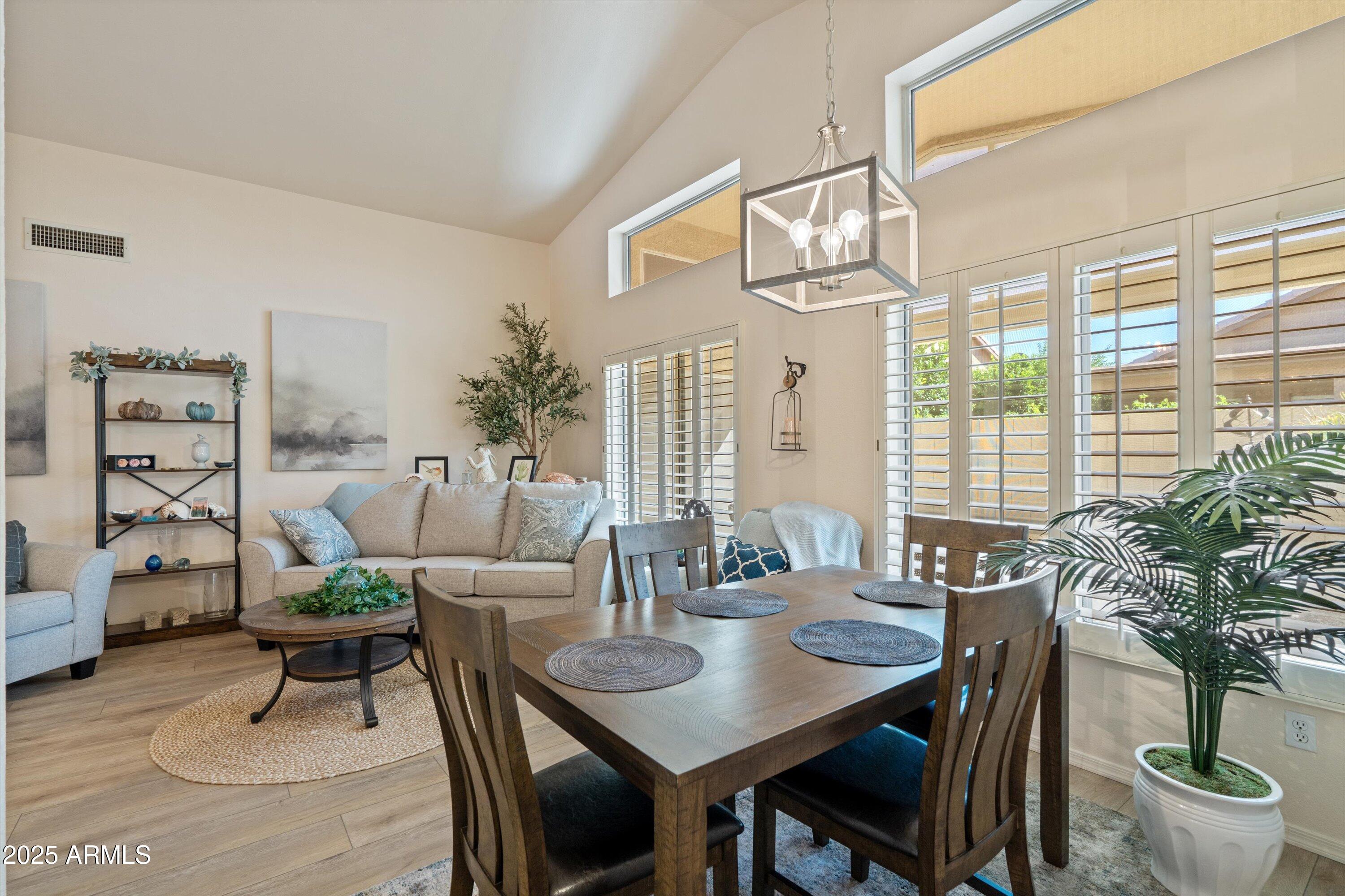 15415 West Merrell Street Goodyear, AZ 85395 - Photo 4 of 33 a view of a dining room with furniture window and outside view