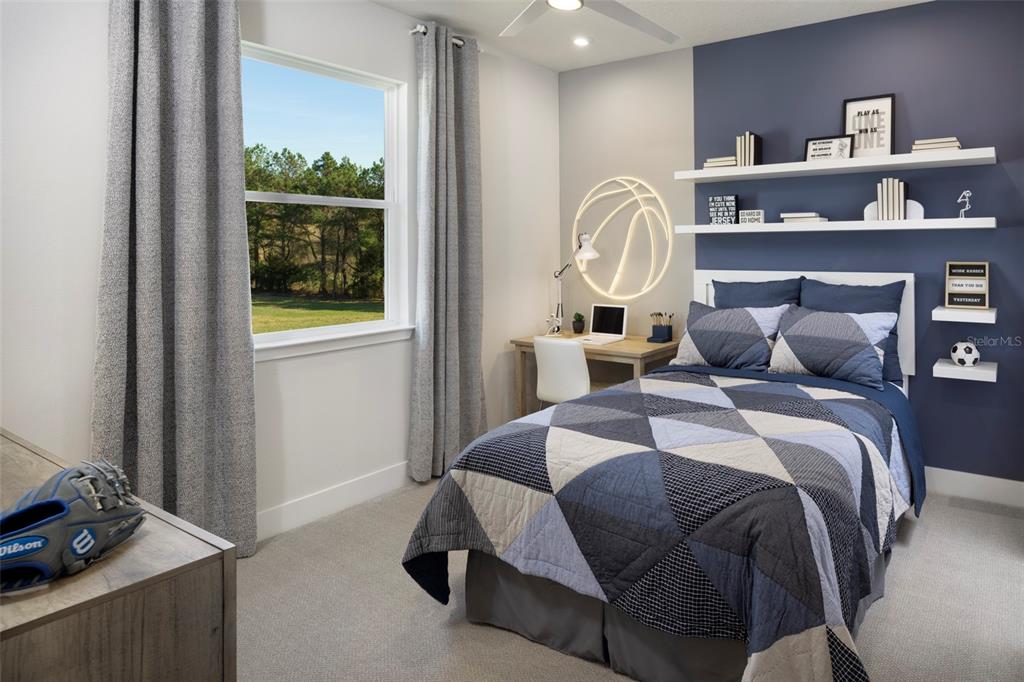 9014 Sundance Terrace Parrish, FL 34219 - Photo 14 of 19 a bedroom with a bed and window