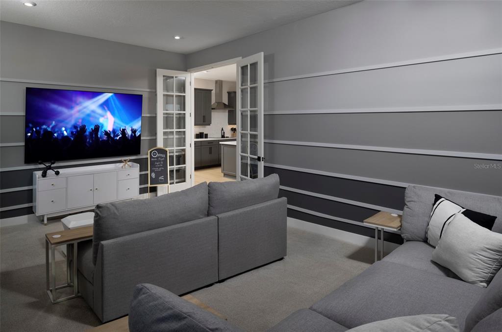 9014 Sundance Terrace Parrish, FL 34219 - Photo 15 of 19 a living room with furniture and a flat screen tv