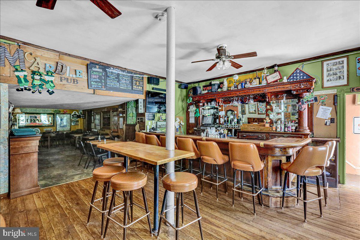 1634 Moselem Spring Road Hamburg, PA 19526 - Photo 11 of 21 a view of a dining area with furniture and chandelier