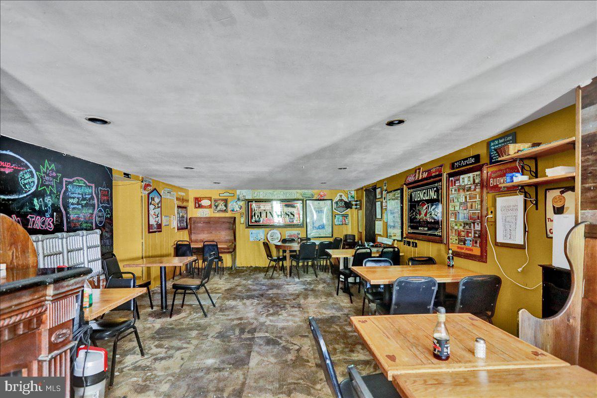 1634 Moselem Spring Road Hamburg, PA 19526 - Photo 12 of 21 a living room with lots of furniture and a large window