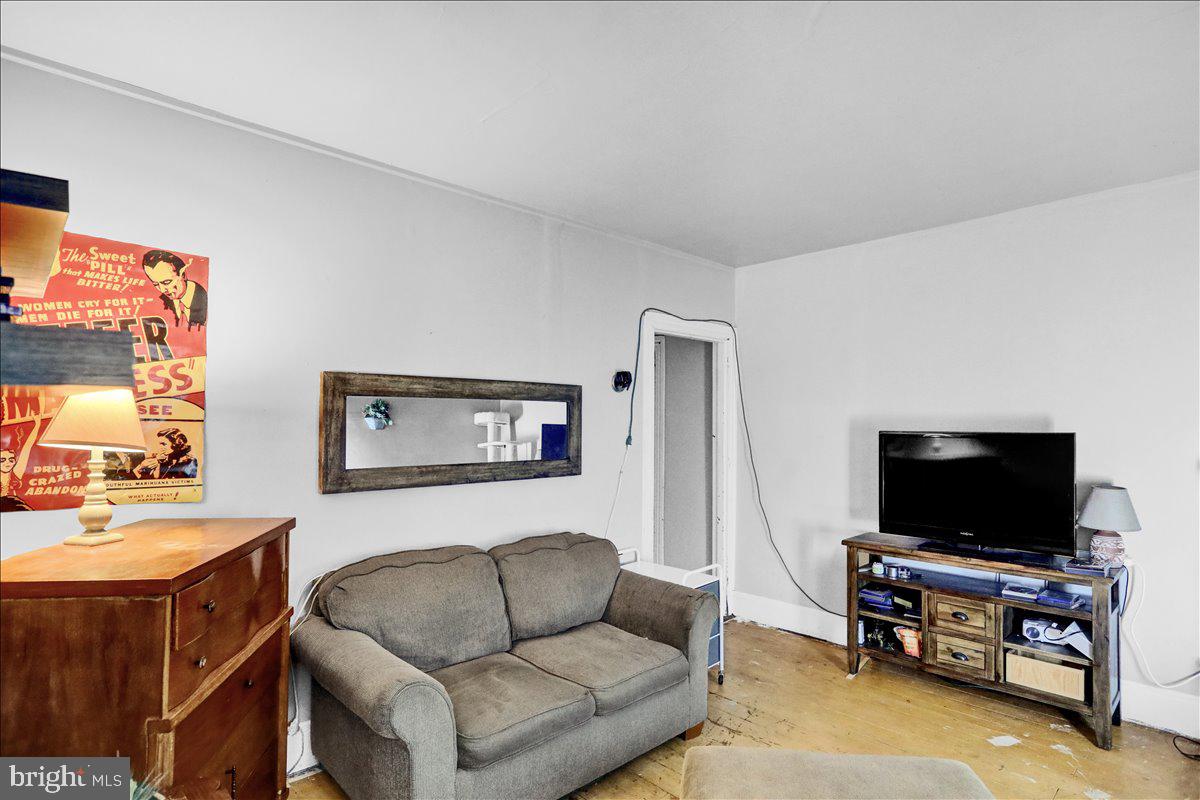 1634 Moselem Spring Road Hamburg, PA 19526 - Photo 20 of 21 a living room with furniture and a flat screen tv