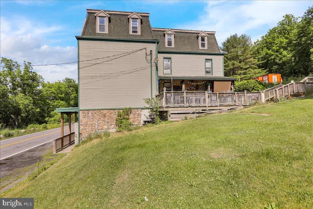 a front view of a house with street