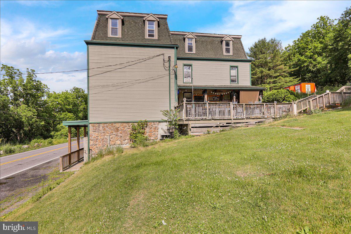 1634 Moselem Spring Road Hamburg, PA 19526 - Photo 6 of 21 a front view of a house with street