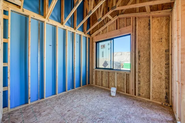 a view of a porch with wooden floor and walls