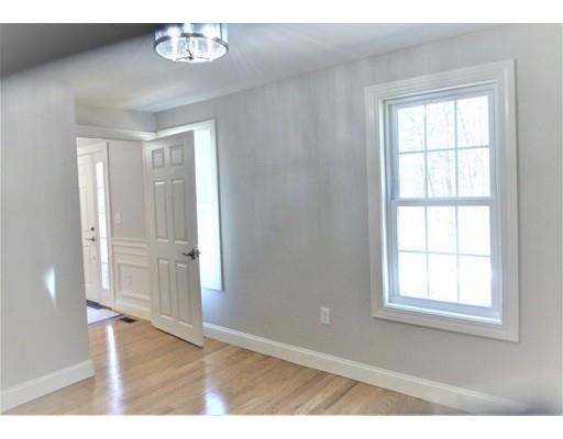 95 Old Mill Road Harvard, MA 01451 - Photo 29 of 42 an empty room with wooden floor closet and windows
