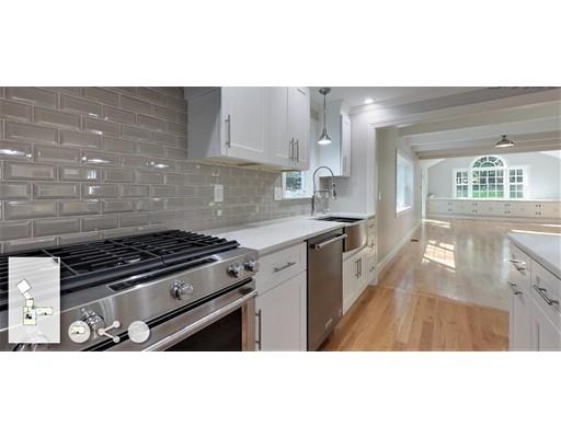 95 Old Mill Road Harvard, MA 01451 - Photo 10 of 42 a kitchen with kitchen island a stove a sink and a refrigerator