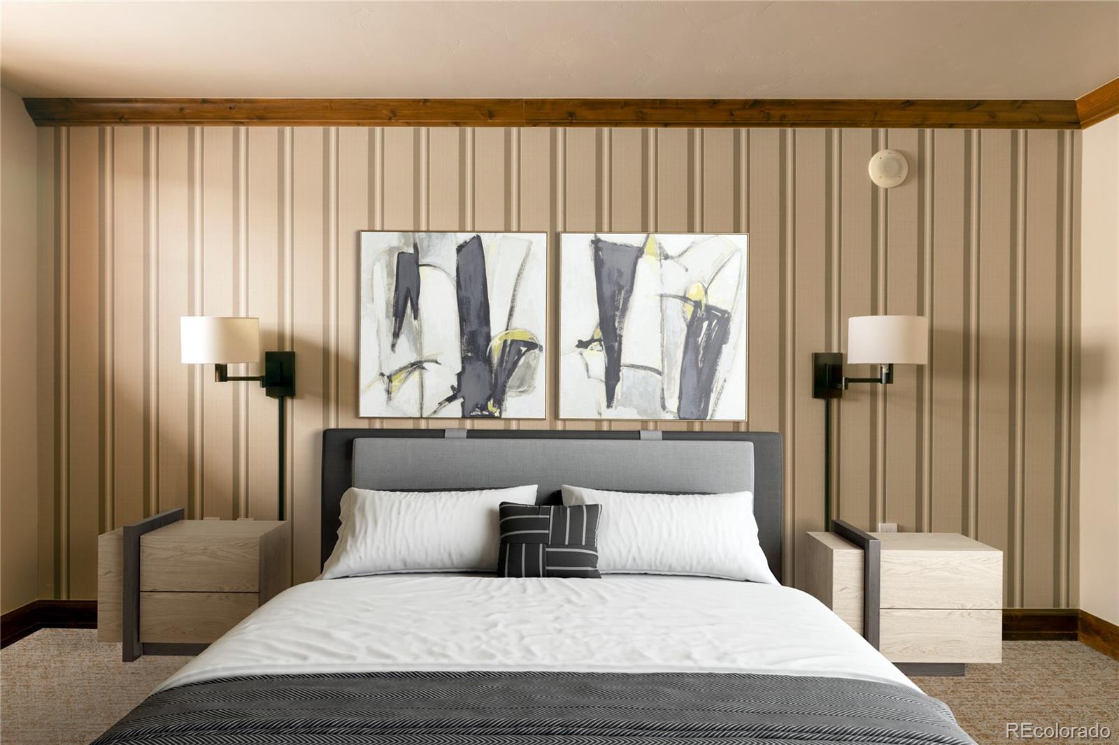 16 Vail Road, Unit 401 Vail, CO 81657 - Photo 20 of 35 a bedroom with a large bed and a couch